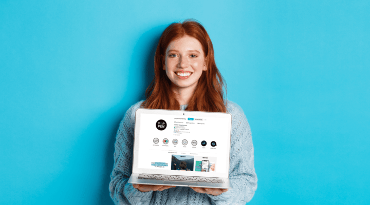 Young woman shows a notebook