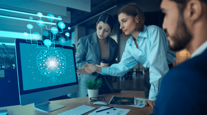 People watching AI on a laptop screen